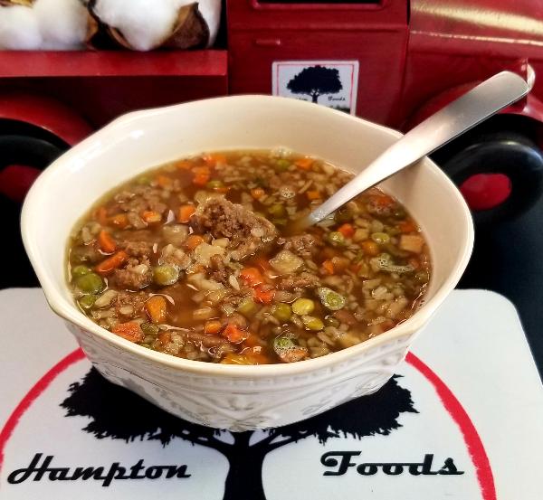 Hampton Foods Freeze Dried Vegetable Beef Soup! Our Vegetable Beef Soup is packed with flavor and nutrients to satisfy your hunger any time, anywhere. Our soup starts with ground beef as the first ingredient, paired with a medley of pasta, long-grain rice, barley, lentils, carrots, peas, potatoes, and spices.