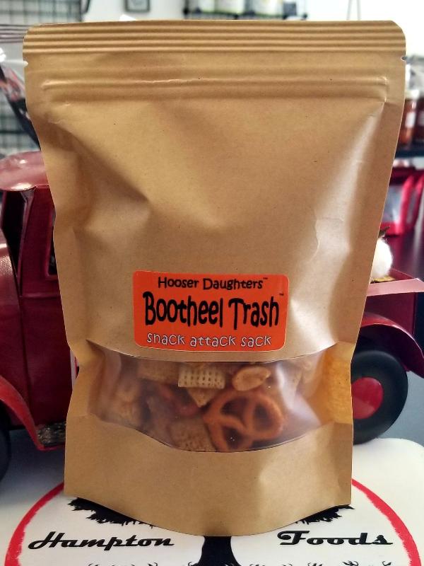 Introducing Hooser Daughters™ Bootheel Trash™ snack mix - a one-of-a-kind blend of your favorite cereals and mouth-watering flavors that will tantalize your taste buds and leave you craving for more!