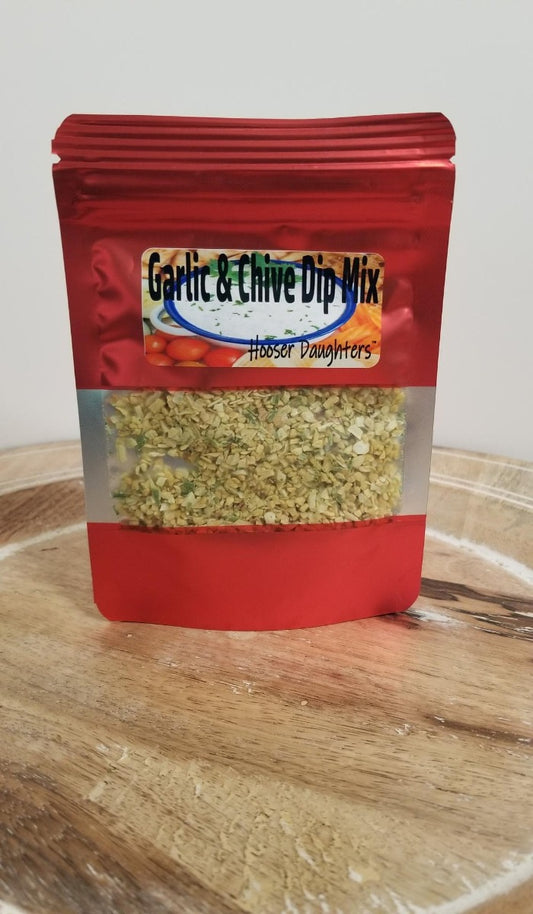 Discover the irresistible Garlic & Chive Dip Mix from Hooser Daughters™. Elevate your culinary creations with a blend of robust garlic and delicate chive flavors. Perfect for dipping snacks or as a bread dip mix with olive oil. Crafted for food enthusiasts seeking convenience without compromising on taste. Unleash your inner chef today!