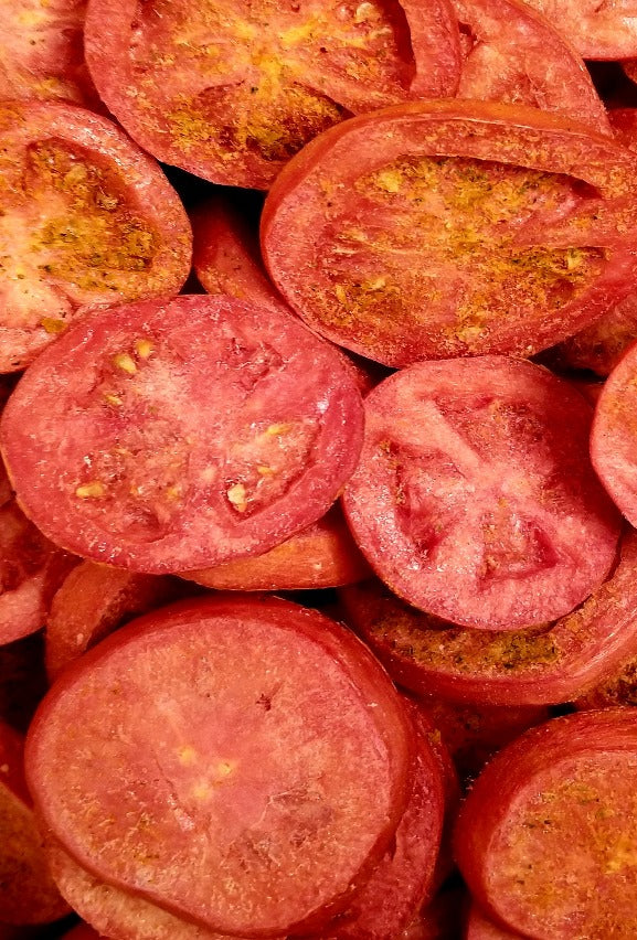 Bacon Tomato Chips, delicious fresh tomato slices freeze dried then lightly seasoned with bacon seasoning. Comes in a triple sealed, resealable window bag. The .80oz finished product is equal to two large Roma tomatoes.