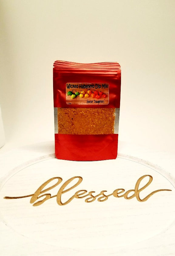 Introducing Hooser Daughters™ Wicked Habanero Dip Mix - the perfect blend of bold chili pepper aroma and mouth-watering flavor with a moderate to high heat kick. If you're a fan of spicy dips that pack a punch, this is the dip mix for you!