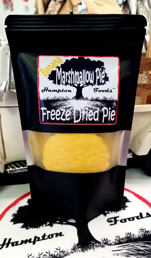 Embark on a flavor-packed journey with Hampton Foods' latest innovation – Freeze-Dried Banana Marshmallow Pie! Picture this: two delectable cookies encasing a velvety marshmallow layer, all harmoniously coated in a heavenly banana-flavored icing. We've elevated the classic to a whole new level.