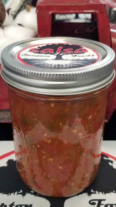 Enjoy the delicious, authentic taste of Hampton Foods' Family Recipe Salsa, available in a 16oz jar. Perfect for chips, tacos, and parties. Order now!