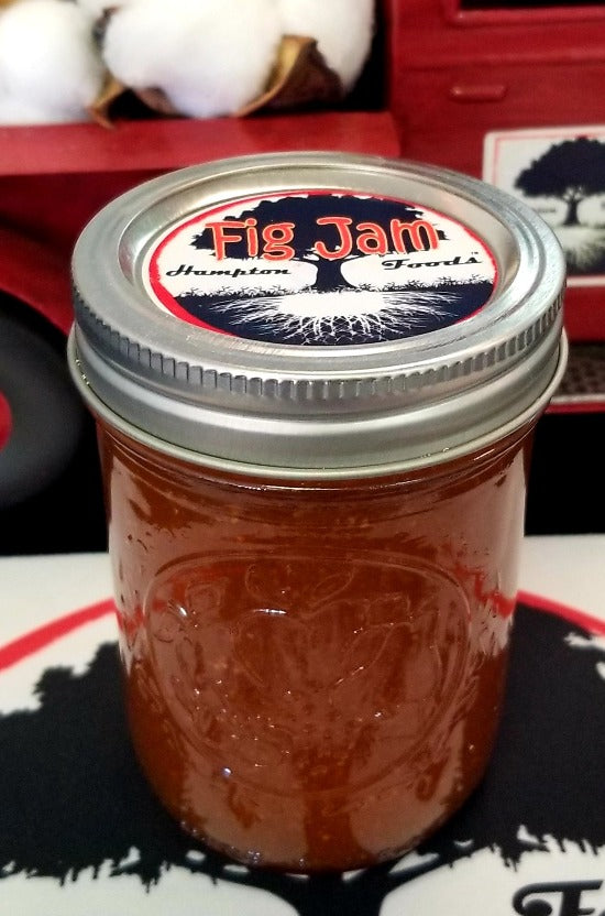 Indulge in the rich taste of Hampton Foods' Family Recipe Fig Jam, available in a 8oz jar. Perfect for toast, cheese boards, and pastries. Order now!