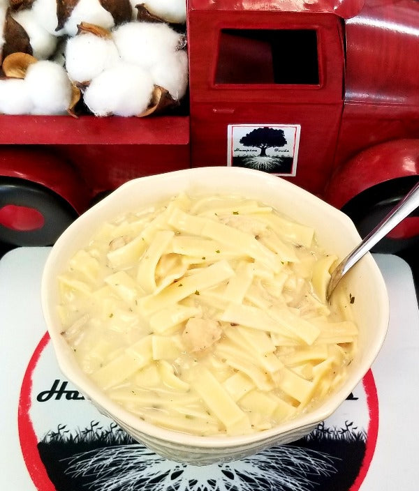 Enjoy a gourmet meal at home with Hampton Foods' Chicken Fettuccine Alfredo. Freeze-dried for freshness and served in a resealable pouch, this creamy, delicious dish is perfect for busy nights and family dinners.