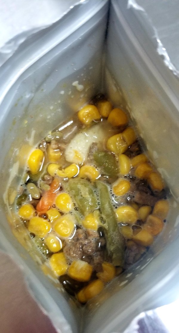 Enjoy the delicious taste of Matt's Hamburger Stew, a hearty freeze-dried meal with ground beef, sweet corn, potatoes, green beans, and carrots. Perfect for trail meals, home-cooked lunches, or long-term storage with a 25-year shelf life. Convenient resealable bags in 2 and 4 servings.