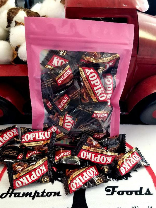 Indulge in the rich flavor and aroma of Kopiko Coffee Candies. Made with real coffee beans from Java, each resealable bag contains 15 delicious pieces. Perfect for coffee lovers!