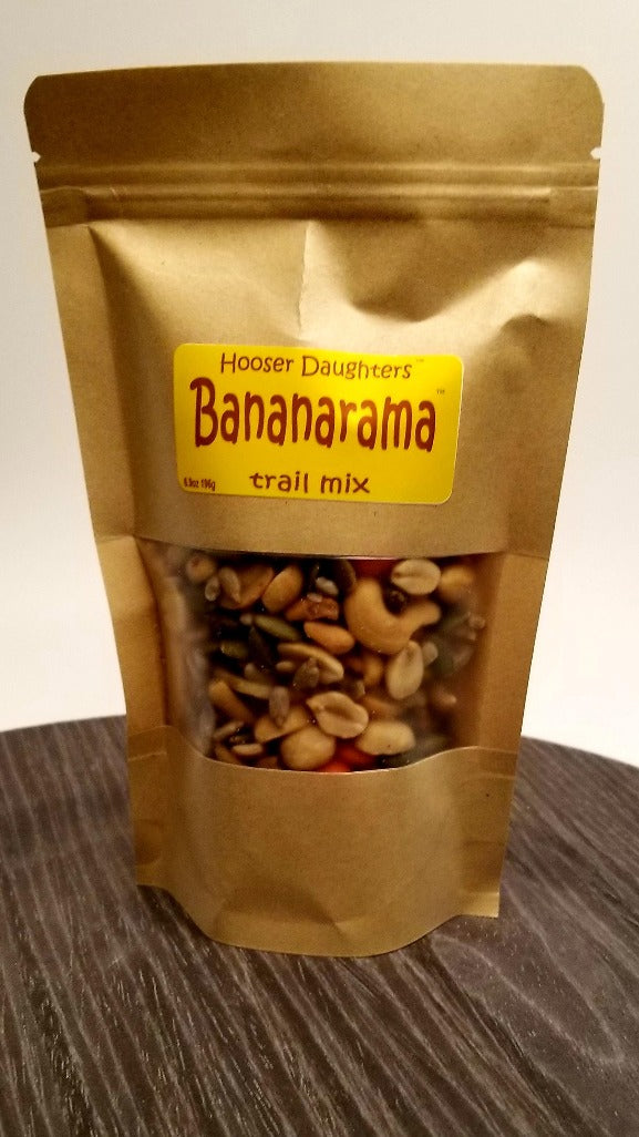 Introducing Hooser Daughters' delicious and nutritious Bananarama Trail Mix! Made with the finest quality ingredients, this trail mix is a perfect blend of flavors and textures that will satisfy your cravings and keep you energized on-the-go.