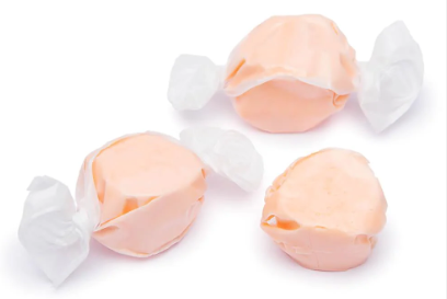 Attention all candy lovers! Introducing Peach Bombs™, the most delicious salt water taffy you'll ever taste! Imagine biting into a crisp and crunchy taffy with an explosion of peach flavor in your mouth. That's exactly what you get with Peach Bombs™ from Hampton Foods. Our taffy is freeze-dried to perfection.