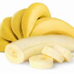 Peeled banana with three slices beside it and  five unpeeled bananas placed behind the afore mentioned.